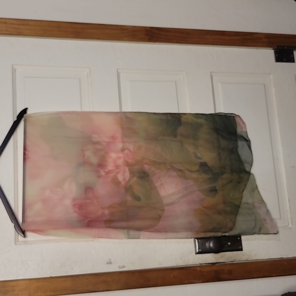 Ultra sheer, soft silk-like polyester scarf with lotus pattern